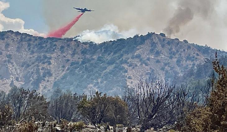 Apache Fire Grows As Firefighters Battle It From The Air And On The Ground